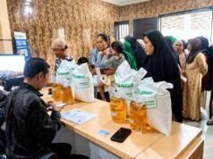 Bantuan Pangan Disalurkan di Desa Lenggahjaya, Sebanyak 569 KPM Terima Beras dan Minyakita