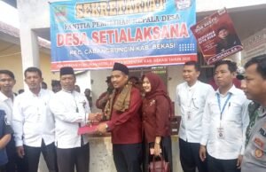 Lautan Merah Iringi Pendaftaran Nur Ali di Pilkades Setialaksana, Yel-yel “Perubahan” Bergema Sepanjang Jalan
